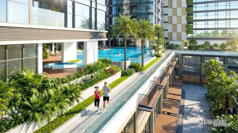Cặp đôi đang chạy bộ trên lối đi trên cao bằng kính trong nội khu Sarina (Sala), bên cạnh hồ bơi vô cực và các tòa nhà căn hộ hiện đại được bao quanh chi phí tiện ích.